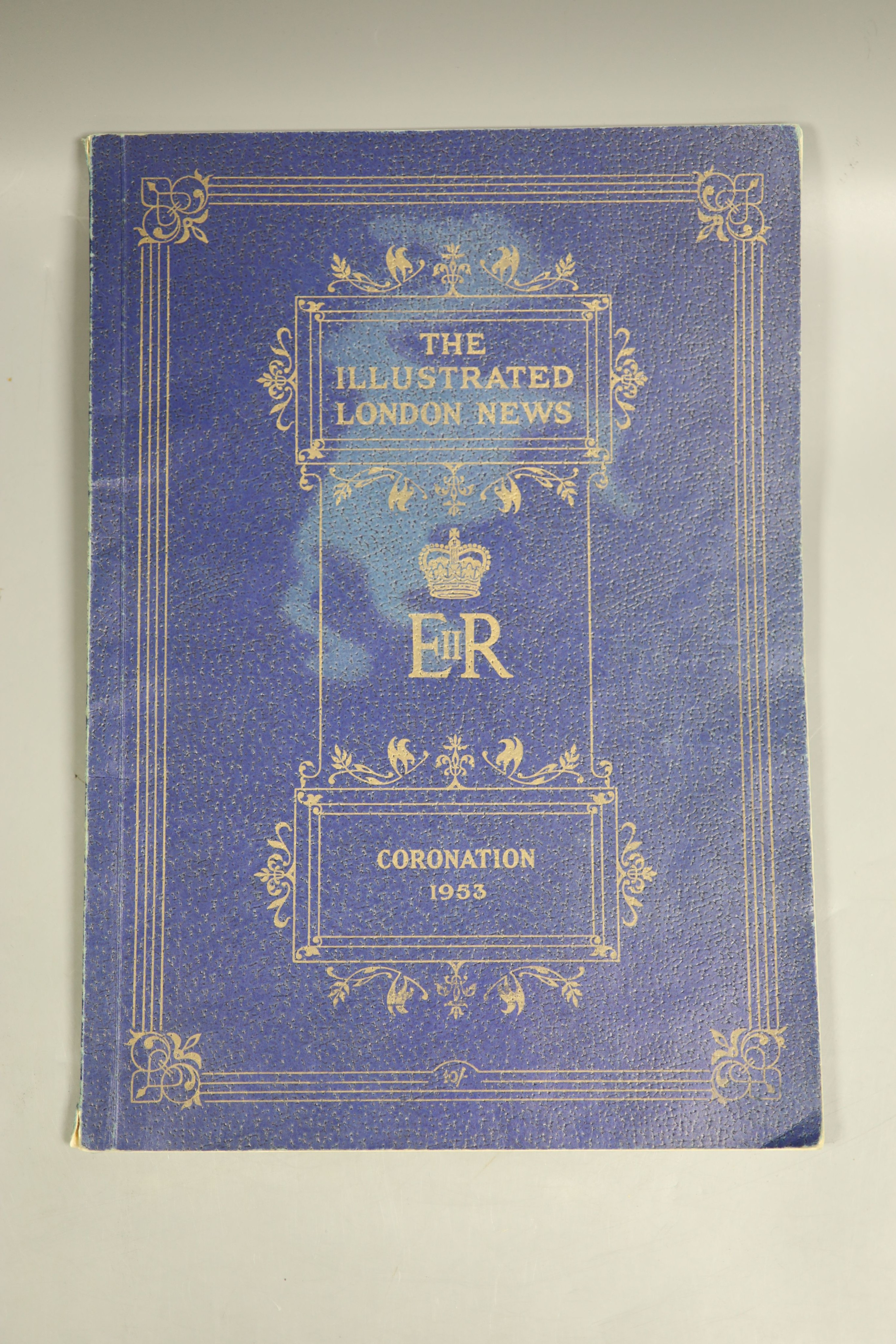 A London Illustrated News 1953 souvenir Coronation book and a small collection of 15 related photographs on three album leaves